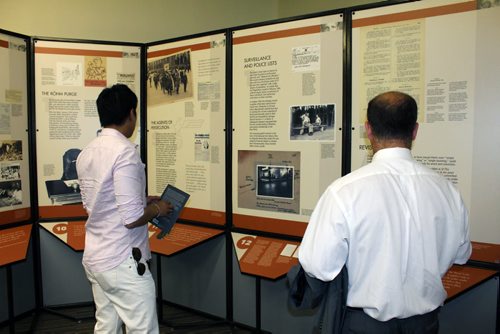 Canstar Community News Visitors to the Rainbow Resource Centre study a traveling exhibit called Nazi Persecution of Homosexuals 1933-1945. The Winnipeg organization is the first Canadian host for the display, which documents how homosexuals were victimized in Nazi Germany.