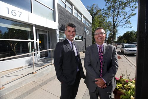 Portrait of MTS president KELVIN SHEPHERD (right in pink tie)  and Epic Information Solutions president and CEO DAVID REID. For a story on how MTS has acquired Epic (a local IT firm) for an undisclosed sum. Murray McNeil story Sept 04,, 2013 Ruth Bonneville Winnipeg Free Press
