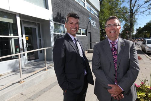 Portrait of MTS president KELVIN SHEPHERD (right in pink tie)  and Epic Information Solutions president and CEO DAVID REID. For a story on how MTS has acquired Epic (a local IT firm) for an undisclosed sum. Murray McNeil story Sept 04,, 2013 Ruth Bonneville Winnipeg Free Press