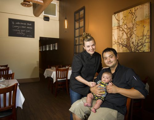 130904 Winnipeg - DAVID LIPNOWSKI / WINNIPEG FREE PRESS (September 04, 2013)  Partners in life and business, Kristen Chemerika-Lew and Kyle Lew with their 3 months old son, Charlie. The couple met at culinary school in Toronto, and have just opened a new bistro/restaurant in River Heights at the corner of Corydon & Waterloo called CHEW.  For Gordon Sinclair Story