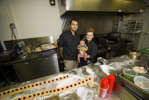 130904 Winnipeg - DAVID LIPNOWSKI / WINNIPEG FREE PRESS (September 04, 2013)  Partners in life and business, Kristen Chemerika-Lew and Kyle Lew with their 3 months old son, Charlie. The couple met at culinary school in Toronto, and have just opened a new bistro/restaurant in River Heights at the corner of Corydon & Waterloo called CHEW.  For Gordon Sinclair Story