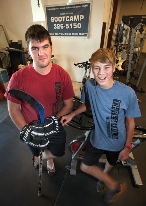 Fitness Column, Taylor Plett (left)  and Roger Thiessen pose at Eastman therapy centre in Steinbach Wednesday. See fitness column by Tim Shantz. September 5, 2013 - (Phil Hossack / Winnipeg Free Press)