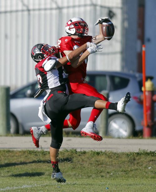 Winnipeg Highschool football league game between the Sisler Spartans and Kelvin Clippers. Game played at Sisler. General action photos. BORIS MINKEVICH / WINNIPEG FREE PRESS. August 4, 2013
