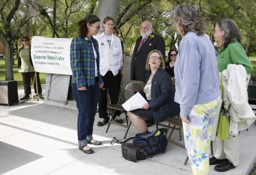 John Woods / Winnipeg Free Press / May 18/07- 070518  - Elizabeth May, leader of the federal Green Party is surrounded by her provincial candidates before a press conference at Coronation Park in St. Boniface Friday, May 18/07.