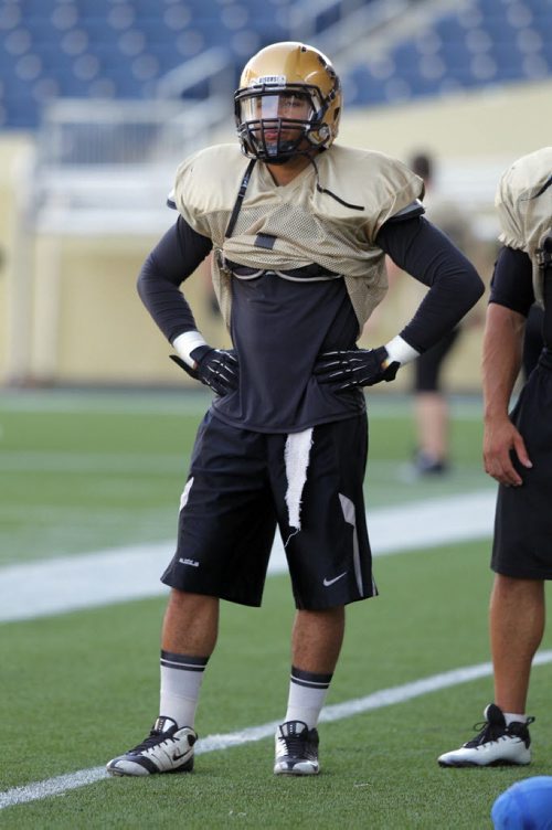 Feature on running back Anthony Coombs of the University of Manitoba Bisons. BORIS MINKEVICH / WINNIPEG FREE PRESS. August 5, 2013