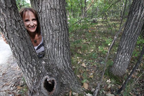 Stephanie Staples by her secret tree along the Seine River that she writes aboutSee Our Winnipeg story- Sept 06, 2013   (JOE BRYKSA / WINNIPEG FREE PRESS)