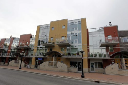 Exterior shot of the Ship Street Village Condo complex. There was a condo in there that sold for $1.3 million in August. Thats the first million-dollar-plus condo sale in downtown Winnipeg. For a story for Saturday on August MLS sales.. BORIS MINKEVICH / WINNIPEG FREE PRESS. August 7, 2013