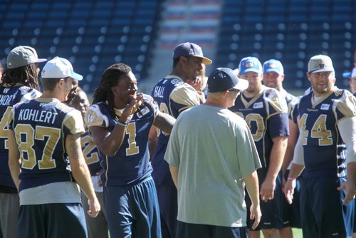 Winnipeg Blue Bombers share some laughs after a walk through practice at Investors Group Stadium Saturday afternoon. Sept 07,, 2013 Ruth Bonneville Winnipeg Free Press