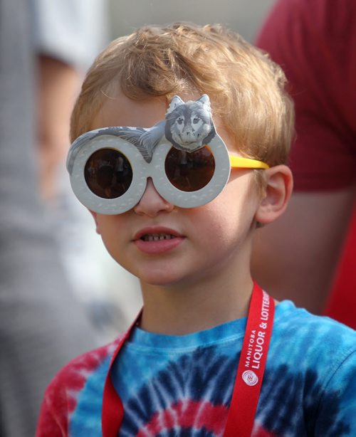 Four year old Harper Simmons wears his foxy sunglasses that he got from the zoo recently to Manyfest with his family. See Adam Wazny's story.  Sept 07,, 2013 Ruth Bonneville Winnipeg Free Press