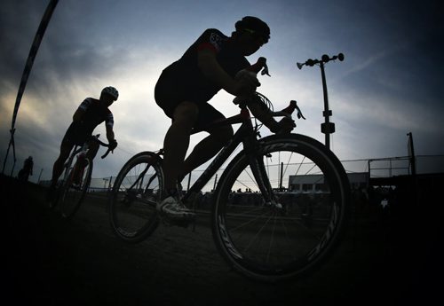 Cyclocross racers participate in Darkcross, an annual race at the Red River Coop Speedway, Saturday, September 7, 2013. (TREVOR HAGAN/WINNIPEG FREE PRESS)