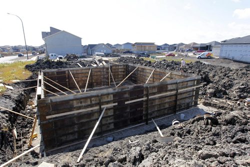 Shot of new homes under construction for a story on how there was a big drop-off in housing starts in the Winnipeg area last month, but its still on track to be one of the best years for new-home construction since the late 1980s. Sage Creek. BORIS MINKEVICH / WINNIPEG FREE PRESS. Sept. 10, 2013