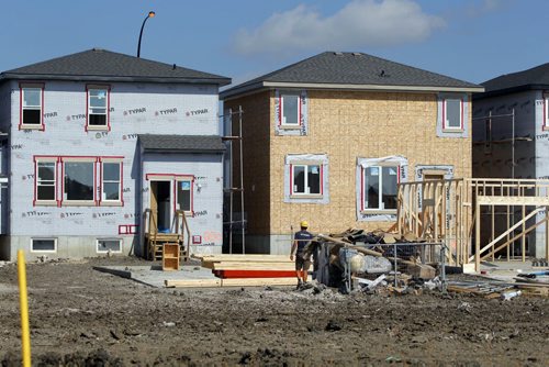Shot of new homes under construction for a story on how there was a big drop-off in housing starts in the Winnipeg area last month, but its still on track to be one of the best years for new-home construction since the late 1980s. Sage Creek. BORIS MINKEVICH / WINNIPEG FREE PRESS. Sept. 10, 2013