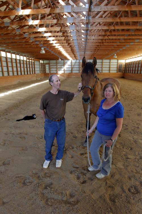 Robert and Liane Parker have horses and a horse arena close to Birds Hill Park. Photo taken in the arena. BORIS MINKEVICH / WINNIPEG FREE PRESS. Sept. 10, 2013