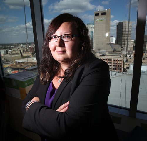 Stacy Soldier poses in her downtown Winnipeg Law office Tuesday. See Mary Agnes Welch story re: Stacey is one of several people commenting on the fact that its 25-years since the start of the AJI. An FYI on whats changed for aboriginal people in the justice system since then.September 10, 2013 - (Phil Hossack / Winnipeg Free Press)