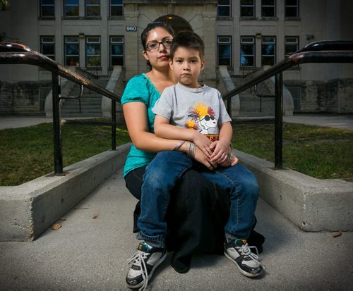 Belhen Rojo and her four-year-old son Jacob in front of Laura Secord School in Wolseley. On the first day of kindergarten, Jacob ended up at the wrong school for the entire day on Monday, without Rojo knowing he had been missing from Laura Secord School until the following day. 130912 - Thursday, September 12, 2013 - (Melissa Tait / Winnipeg Free Press)