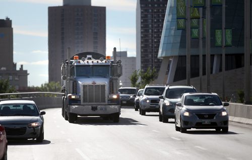 Tractor trailers and other heavy truck traffic makes it's way across the Provencher Bridge and down the boulevard Thursday afternoon. See story. September 12, 2013 - (Phil Hossack / Winnipeg Free Press)