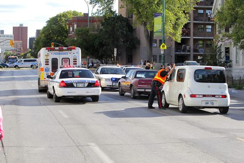 MVC vs. PEDESTRIAN. A person was convayed to hospital by ambulance after being hit by a car on Balmoral (southbound lane) between Sargent and Cumberland. Emergency crews cleaned up the scene by 7:15. BORIS MINKEVICH / WINNIPEG FREE PRESS. Sept. 12, 2013