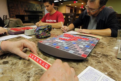 Winnipeg Scrabble Club meets every Thurs at the Kenaston Village Rec Centre. 2013 marks the 75th anniversary of the invention of Scrabble. Calvin Dick and Colin Viebrock in photo. BORIS MINKEVICH / WINNIPEG FREE PRESS. Sept. 12, 2013