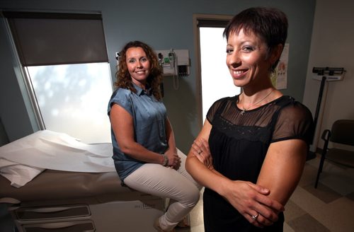 Annabelle Reimer, the lead nurse practitioner, and Frankie Scribe, (right in black) the manager of Winnipeg quick Care clinics. See Larry Kusch story - September 13, 2013 - (Phil Hossack / Winnipeg Free Press)