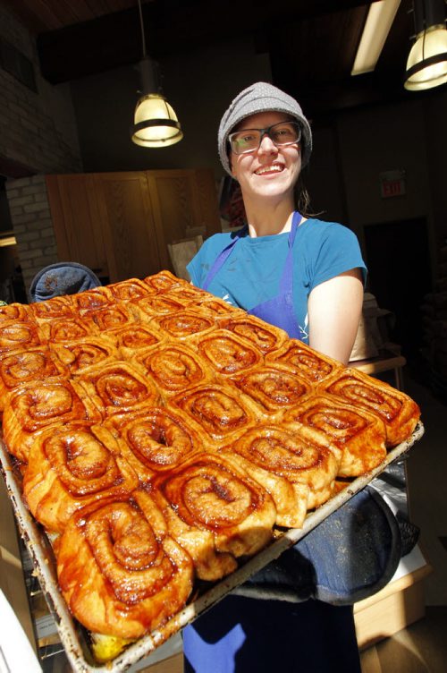 This is for a story celebrating National Cinnamon Bun Day. Reba Terlson of Tall Grass Prairie with some cinnamon buns. BORIS MINKEVICH / WINNIPEG FREE PRESS. Sept. 13, 2013