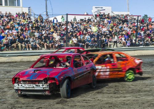 130914 Winnipeg - DAVID LIPNOWSKI / WINNIPEG FREE PRESS (September 14, 2013)  Action from the 4th Annual Teen Challenge Demolition Derby at Red River Co-op Speedway Saturday afternoon.  Daring drivers drove donated vehicles prepared by Teen Challenge students and graduates. Proceeds from the event went towards the addiction recovery and awareness programs offered by Teen Challenge of Central Canada.