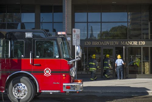 130914 Winnipeg - DAVID LIPNOWSKI / WINNIPEG FREE PRESS (September 15, 2013)  Winnipeg fire fighters responded to a fire call at Broadview Manor Sunday morning.