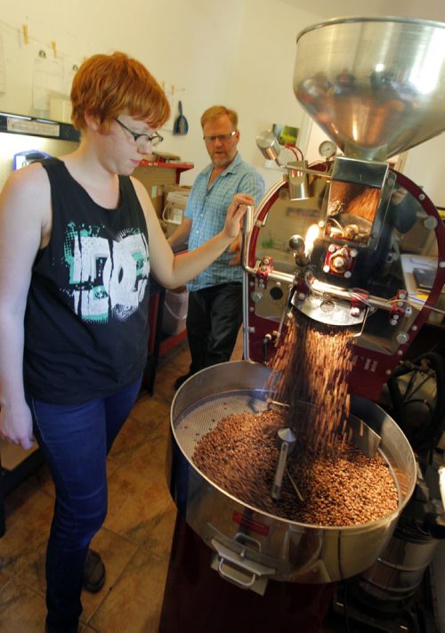 Green Bean Coffee Imports in Petersfield, Manitoba. Owner Derryl Reid. His daughter Alix, left,  works there roasting coffee beans. BORIS MINKEVICH / WINNIPEG FREE PRESS. Sept. 17, 2013