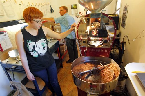 Green Bean Coffee Imports in Petersfield, Manitoba. Owner Derryl Reid. His daughter Alix,left, works there roasting coffee beans. BORIS MINKEVICH / WINNIPEG FREE PRESS. Sept. 17, 2013