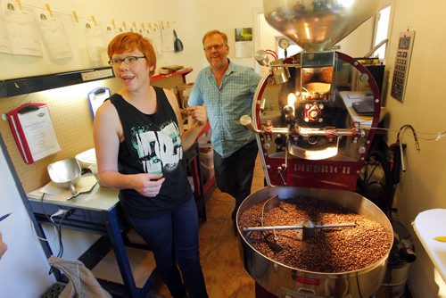 Green Bean Coffee Imports in Petersfield, Manitoba. Owner Derryl Reid. His daughter Alix, left, works there roasting coffee beans. BORIS MINKEVICH / WINNIPEG FREE PRESS. Sept. 17, 2013