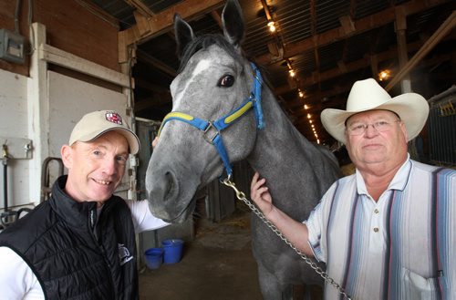 Jockey  Paul Nolan, left, and trainer  Ardell Sayler with Smoke Show. Unless a miracle happens Nolan will repeat as top jockey and Ardell will win his 11th trainer title when everything comes to a close here on Sept. 22. -See Al Besson story story- Sept 18, 2013   (JOE BRYKSA / WINNIPEG FREE PRESS)