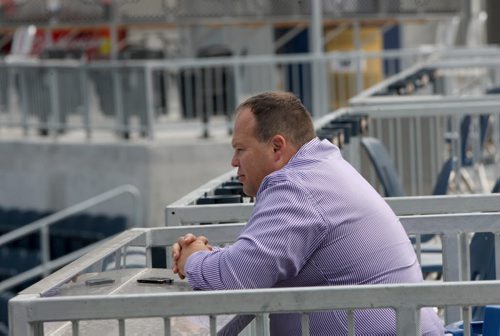 Wade Miller acting Chief Executive Officer for the Winnipeg Blue Bombers watches practice from up high at Investors Group Field in Winnipeg-See Paul Wiecek story- Sept 18, 2013   (JOE BRYKSA / WINNIPEG FREE PRESS)