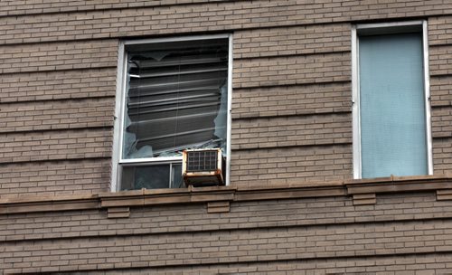 A shattered window on the 3rd story of the Sterling Building 283 Portage Ave Wednesday...September 18, 2013 - (Phil Hossack / Winnipeg Free Press)