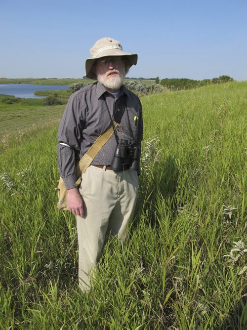 James Ritchie, an oral historian, overlooks an unheralded by likely intact mound southeast of Boissevain. BARTLEY KIVES / WINNIPEG FREE PRESS
