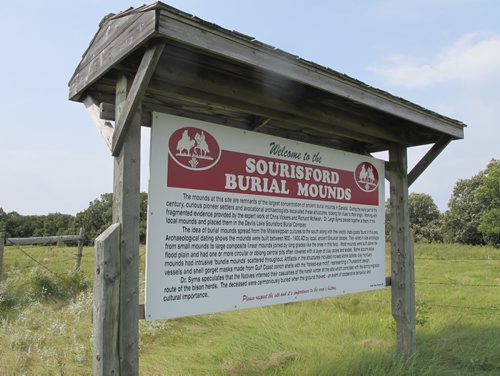 Sourisford1: Interpretive sign placed by municipal authorities outside Linear Mounds National historic site. Parks Canada draws no attention to the site. BARTLEY KIVES/WINNIPEG FREE PRESS