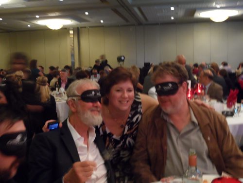 MAUREEN SCURFIELD/WINNIPEG FREE PRESS  Dining in the Dark CNIB charity party L-R entertainer Fred Penner, Free Press's Rae-Ann Smith, Doug Speirs