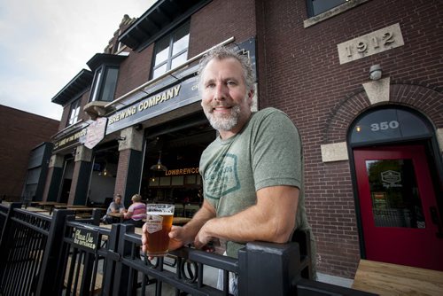 Kenora September 19 2013 - Taras Manzie in front of the Lake of the Woods Brewing Co. photo by Tom Thomson
