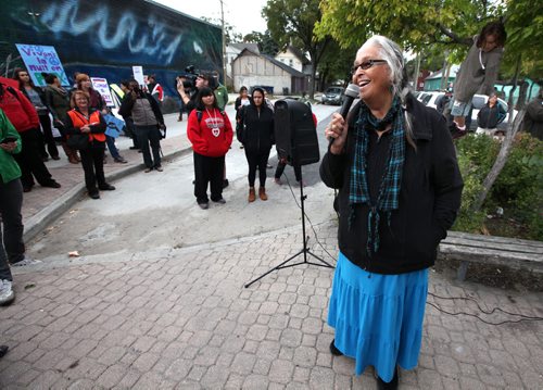 Mae Louise Campbell, elder in residence at RRC addresses the crowd of about 200 marchers in the annual Take Back the Night March Thursday evening on Selkirk Ave. See Carol Sanders story. September 19, 2013 - (Phil Hossack / Winnipeg Free Press)