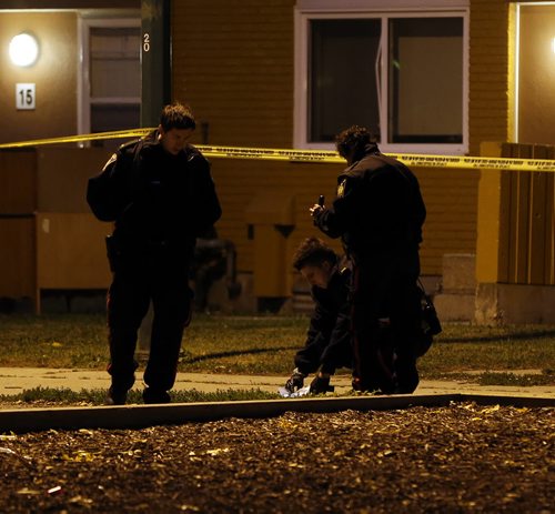 Police investigate brawl that occurred in a Man. Housing project on Robinson St that left one person dead  KEN GIGLIOTTI / SEPT 20 2013 / WINNIPEG FREE PRESS