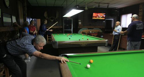 Sunday Xtra. Ted Kurtas lines up a shot at Eddy's Restaurant and Billiards at  669 Selkirk Ave.  Dave Sanderson story. Wayne Glowacki / Winnipeg Free Press Sept. 20 2013