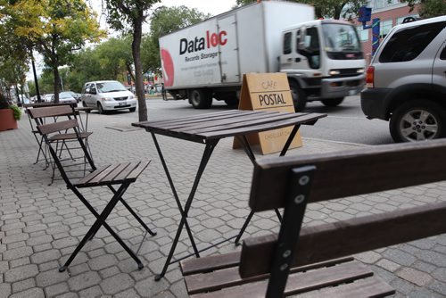 Cafe  Postal on Provencher Blvd with trucks smoking by - Sept 20, 2013   (JOE BRYKSA / WINNIPEG FREE PRESS)