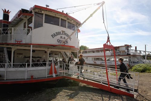 Passengers board the Paddlewheel Queen as it got ready to cruise the Red River for the last time this year. 130922 September 22, 2013 MIKE DEAL / WINNIPEG FREE PRESS