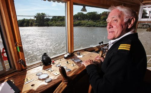 First Mate Glyn Thomas pilots the Paddlewheel Queen as it cruised the Red River for the last time this year. 130922 September 22, 2013 MIKE DEAL / WINNIPEG FREE PRESS