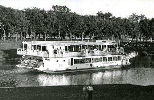 From the August 1st edition of the Winnipeg Free Press: Replica of a 19th century stern-wheeler strated regular cruises on the Red River Wednesday. The boat leaves its home dock near Nairn Avenue, in Elmwood, makes a trip to a point just past Middlechurch and returns in three hours. Tentative schedule calls for three trips on weekdays, four trips Saturdays and Sundays. There is a band on board for the last trip each day, at 10 p.m.; recorded music (via stereo) on other trips. Paddlewheel Queen - July 30, 1965 Winnipeg Free Press