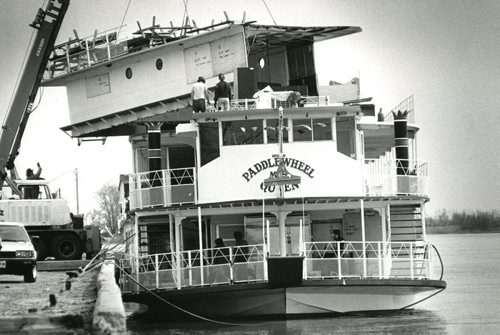 From the May 4, 1989 edition of the Winnipeg Free Press: Too tall - The Paddlewheel Queen gets her top two decks removed at the Selkirk dock so she can cruise under Winnipeg bridges this summer from her new location in The Forks redevelopment area. Owner Joe Slogan estimates the cost of the renovations at about $200,000 but expects more passengers from the new docking site. (Phil Hossack/Winnipeg Free Press)