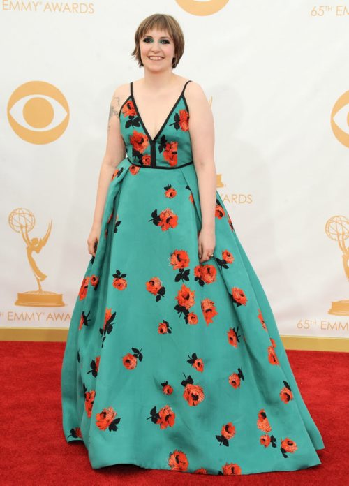 Lena Dunham arrives at the 65th Primetime Emmy Awards at Nokia Theatre on Sunday Sept. 22, 2013, in Los Angeles.  (Photo by Jordan Strauss/Invision/AP)