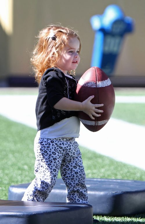 Winnipeg Blue Bomber QB Max Hall's 2 year old daughter Hayden horses around on the field at Investors Group Stadium after practice Tuesday afternoon. Standup sports. Sept  24,, 2013 Ruth Bonneville Winnipeg Free Press