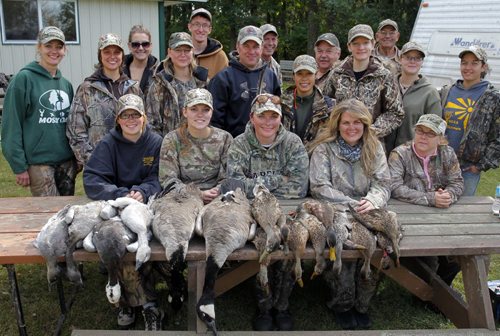 Manitoba Wildlife Federation's Women's waterfowl hunt.  Group shot at the end of the weekend. BORIS MINKEVICH / WINNIPEG FREE PRESS. Sept. 22, 20134415