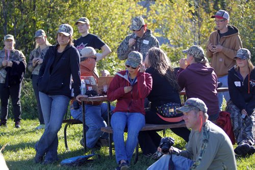 Manitoba Wildlife Federation's Women's waterfowl hunt. The group waits their turn for shooting clay targets. BORIS MINKEVICH / WINNIPEG FREE PRESS. Sept. 21, 2013