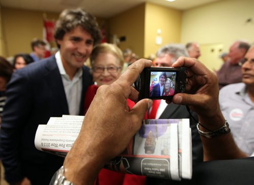 Justin Trudeau poses for photos in Lorette Wednesday evening. Trudeau spoke at a nomination meeting where Terry Hayward was acclaimed to run in Provencer. See story...September 25, 2013 - (Phil Hossack / Winnipeg Free Press)