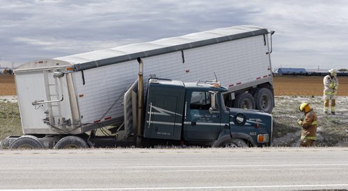 STDUP MVC -Car vs Semi on the Perimeter Hwy 101 just north of Gunn Rd sent one person to hospital  and jack knifed the semi , traffic southbound is getting by on the curb lane Äì occurred 11:30am KEN GIGLIOTTI / SEPT 27 2013 / WINNIPEG FREE PRESS